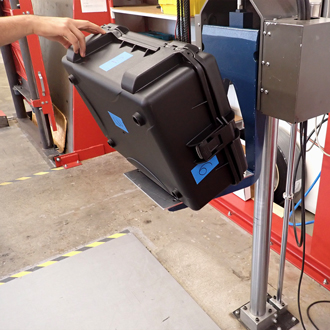 SINORA case is dropped onto a steel plate from a defined height during a drop test